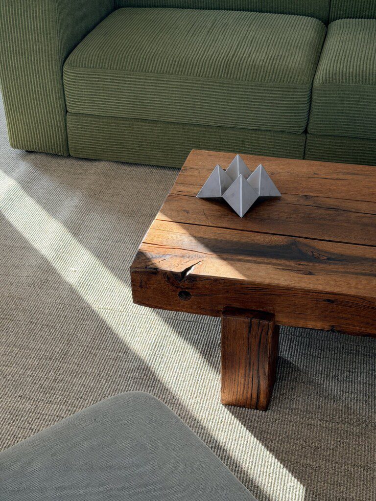 FOLDED on a wooden coffee table